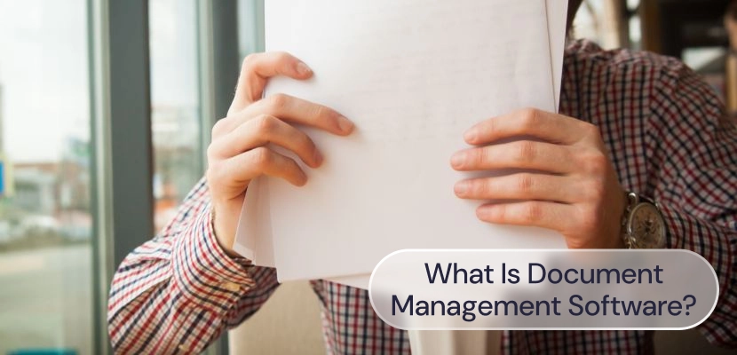 A man holding a stack of papers, with the label: What is document management software?