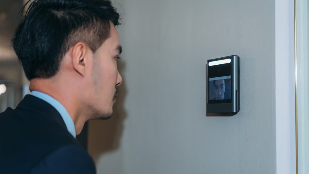 Employee using a face recognition time attendance system